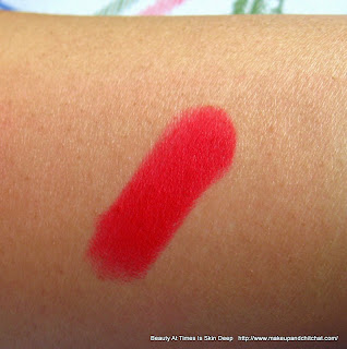 MAC Ruby Woo Swatch on brown skin MAC Ruby Woo swatcfh on warm skin tone