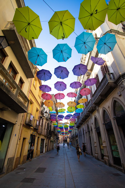 Iglesias-Ombrelli colorati in via Giacomo Matteotti