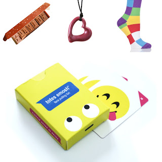 Stocking fillers for our autistic kids including Totes Emosh game, Chocolate letters, Chewellry and seamless socks