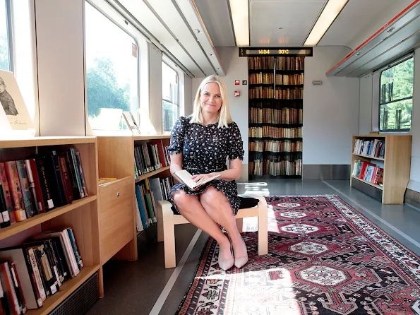 Crown Princess Mette-Marit  completed at Literature Train 2016 events. Princess Mette-Marit wears Valentino dress