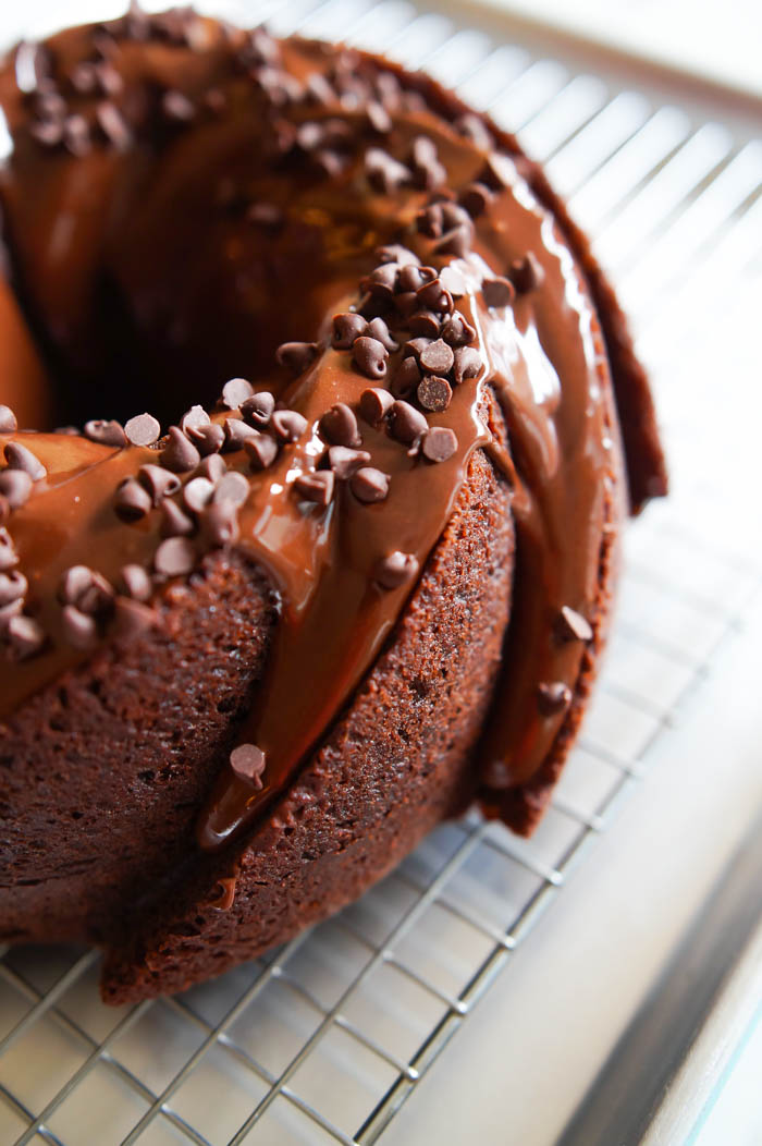 Cocoa Bundt Cake...a rich and moist chocolate cake with a shiny chocolate glaze. Easy to make and perfect for sharing! | bakeat350.net