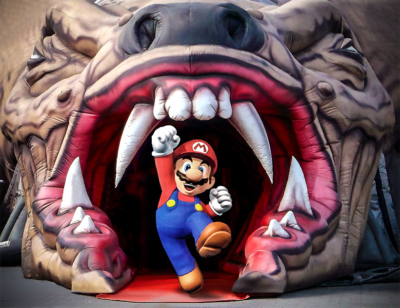 śWirus - Hydraulik Mario skaczący do góry w paszczy z kłami