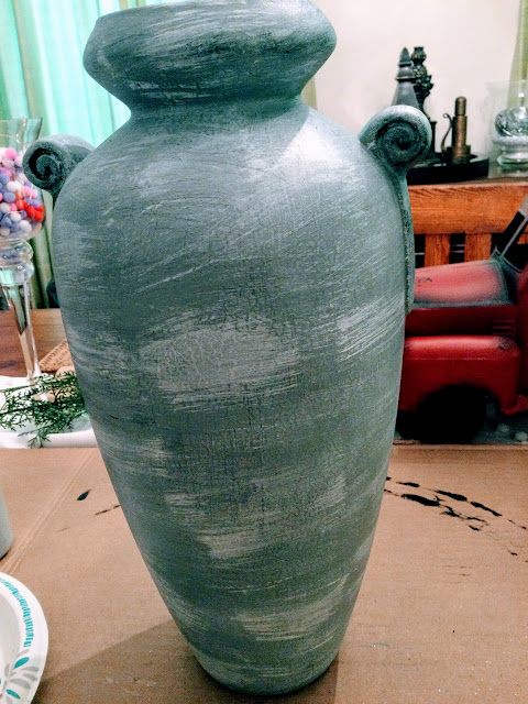 Vase painted with gray paint