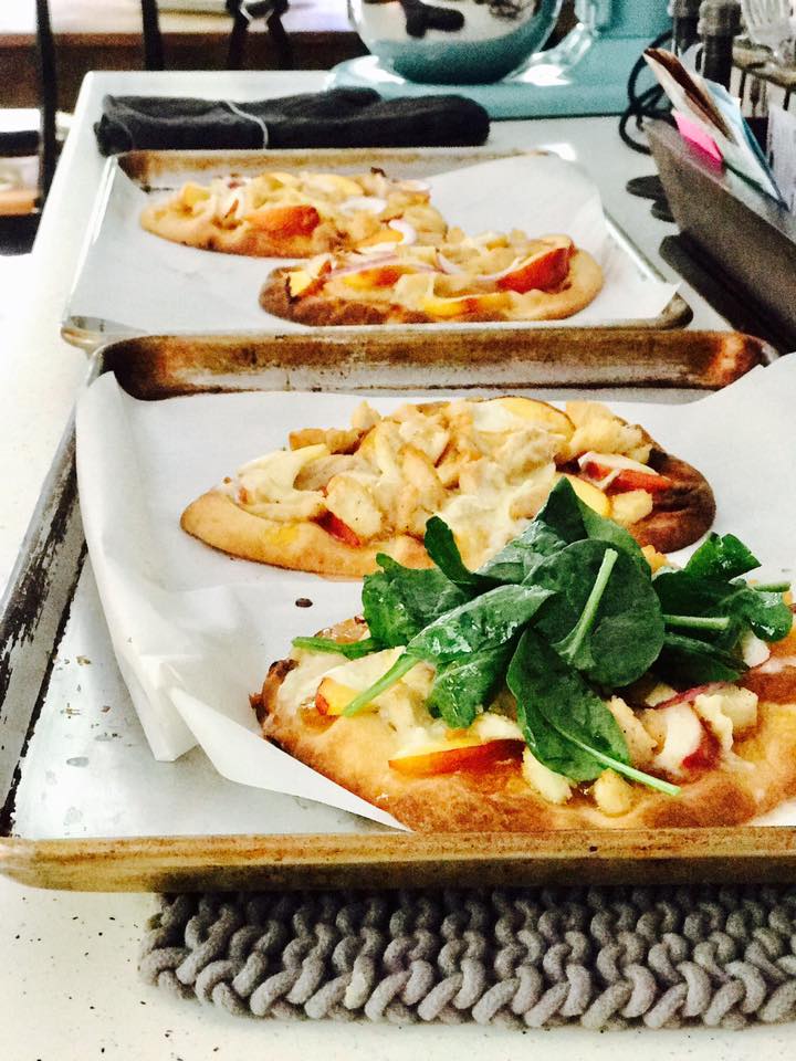 Chicken, brie, and peach meddle together to create a fresh and unique flatbread. Chicken, brie, and peach meddle together to create a fresh and unique flatbread.