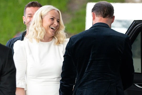 At the birthday party, Crown Princess Mette-Marit wore a new ruffled cady mini dress by Dolce & Gabbana