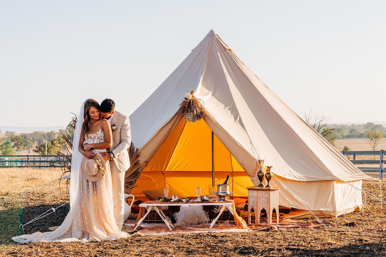 to the aisle australia | champagne at sunrise summer land camels shoot match made photography gold coast weddings country boho floral design cake stationery venue