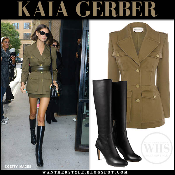 Kaia Gerber in khaki military jacket, mini skirt and black knee boots ...