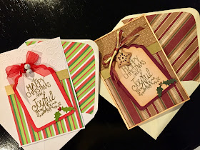 Two hand made Christmas cards with die cut tag shapes, heat embossed greeting and various embellishments