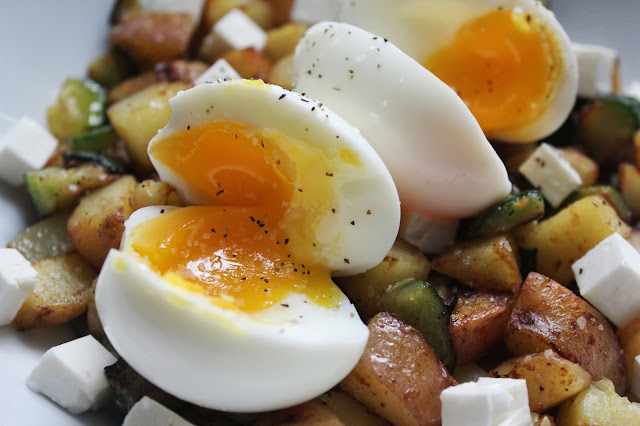 Zucchini hash with soft-cooked eggs