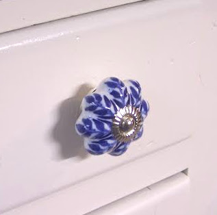 blue painted ceramic knob