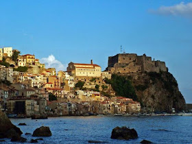 The ancient fishing village of Chianalea sits on the water's  edge in the shadow of the Castello Ruffo
