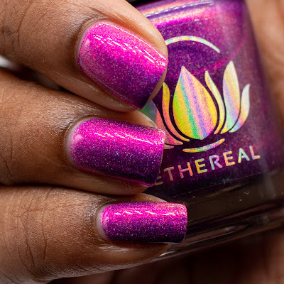 violet shimmer polish with holographic flakies on dark skin