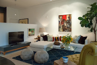 Assorted Modern Sofa Bed for Various Modern Rooms Eclectic Living room with Long Modern Sofa Bed and a Clear Glass Table on the Dark Carpet