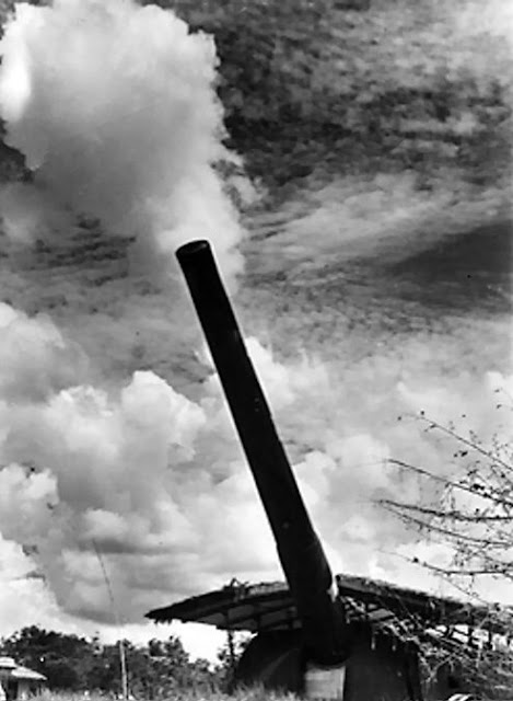 Coastal gun firing at Singapore ca. 1941 worldwartwo.filminspector.com