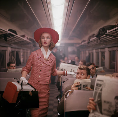 Tony Vaccaro, The Fashion Train, NYC (1960), color photo of fashion model on NY commuter train, 1960