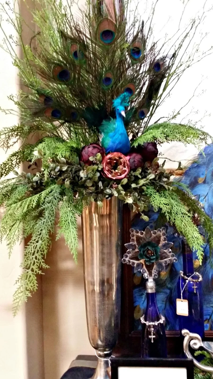 Decorating a floral with peacocks