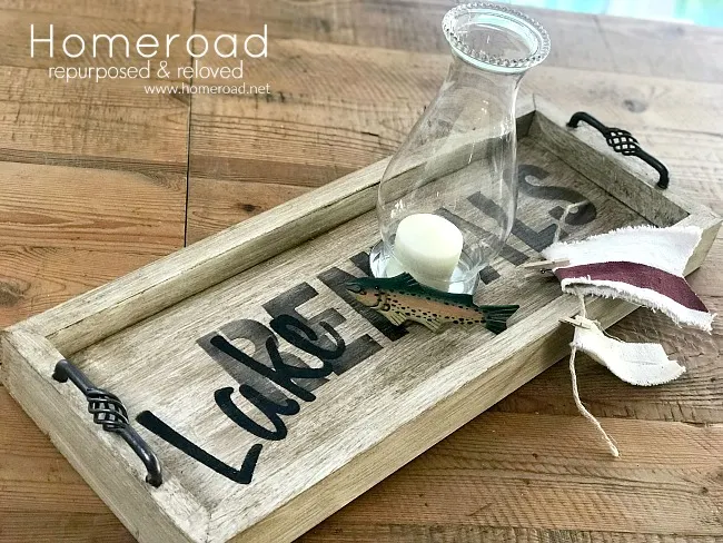 Rustic tray with a lakehouse rental stencil