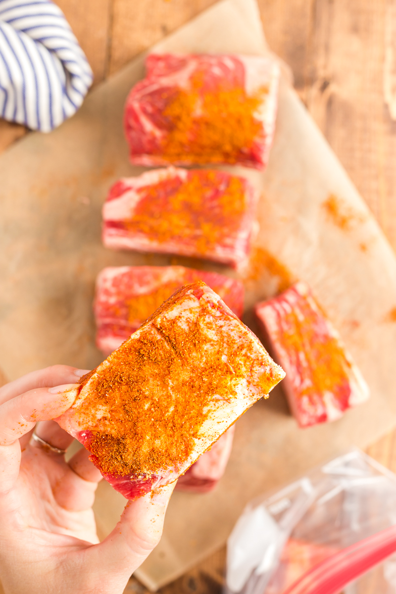 Coconut Curry Beef Short Ribs - These keto-friendly, tender, succulent beef short ribs braised in a creamy coconut curry sauce are the stuff of low carb dreams! #keto #lowcarb #beef #shortribs #indian #curry #coconut #glutenfree | bobbiskozykitchen.com