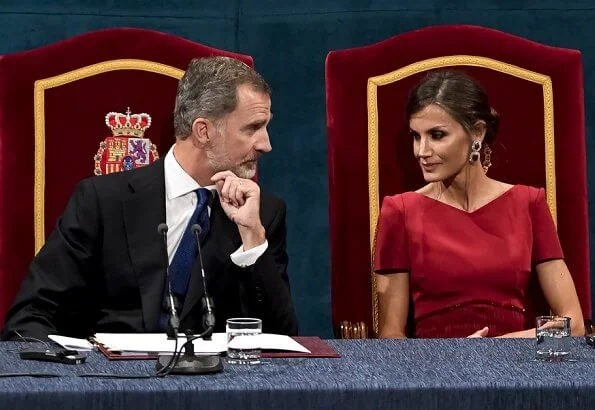 Queen Letizia, Queen Sofia, Crown Princess Leonor and Infanta Sofia. Queen Letizia wore a red satin dress and earrings