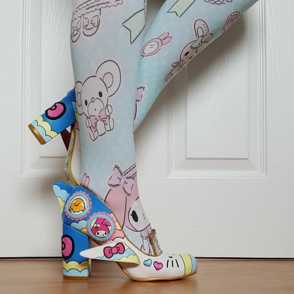 wearing blue Sanrio shoes with winged aeroplane features