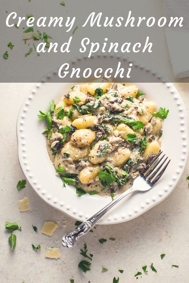 Creamy and delicious vegetarian mushroom and spinach gnocchi with a creamy parmesan and white wine sauce. Creamy and delicious vegetarian mushroom and spinach gnocchi with a creamy parmesan and white wine sauce.