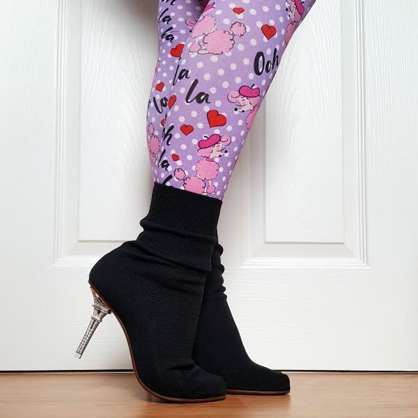 wearing poodle patterned tights with Eiffel Tower heeled boots