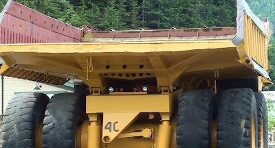 empty box on giant Caterpillar dump truck used in mining