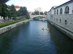 Kayaking on the  Ljubaljanica river in Ljubljana Old town.