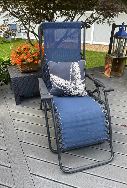 Blue zero gravity chair with starfish pillow