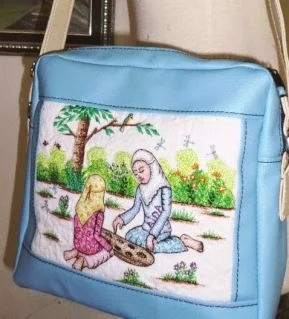 Tas berhias lukis bordir gadis bermain congklak