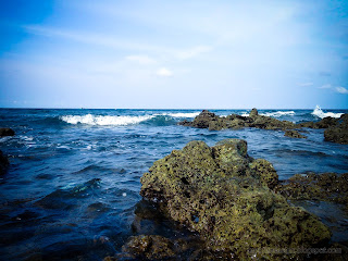 Seawater Waves And Rocky Coral Reefs Of The Beach At Umeanyar Village, North Bali, Indonesia