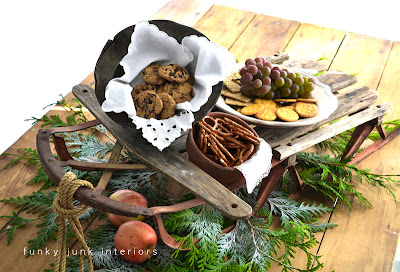 A vintage sleigh food centrepiece for Christmas via Funky Junk Interiors A vintage sleigh food centrepiece for Christmas via Funky Junk Interiors