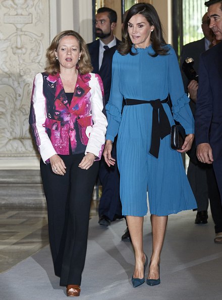 Zara pleated jumpsuit dress with belt from spring summer collection. Queen Letizia wore a pleated jumpsuit by Zara