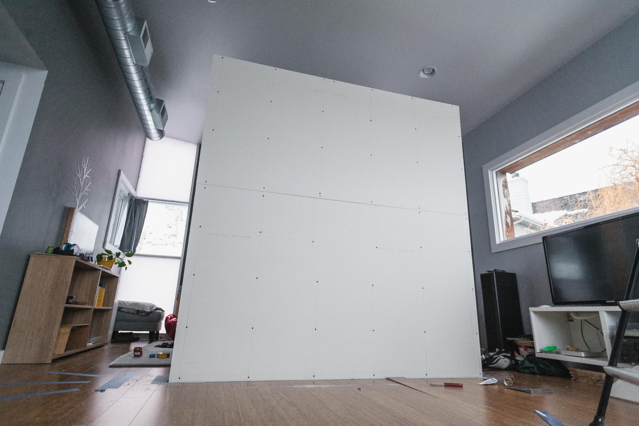 Building the floating wall sheetrock and painting