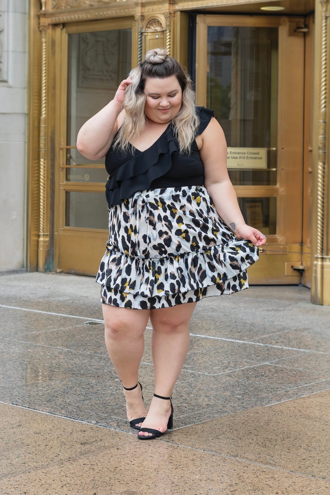 Chicago Plus Size Petite Fashion Blogger, influencer, YouTuber, and model Natalie Craig, of Natalie in the City, reviews SheIn's mini skirts and crop tops.