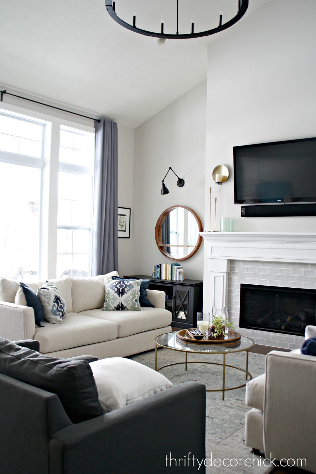 family room with tall ceilings and big windows