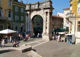 Pula in Sardinia has many Roman ruins such as this arch in the centre of the town