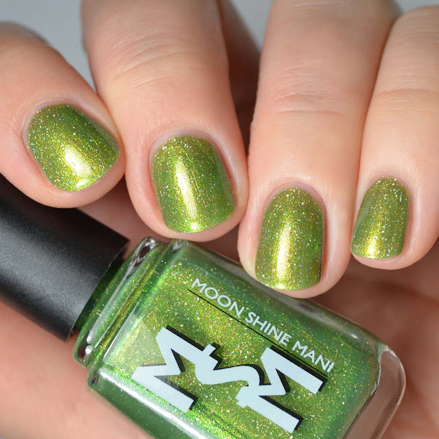 green shimmer nail polish swatch