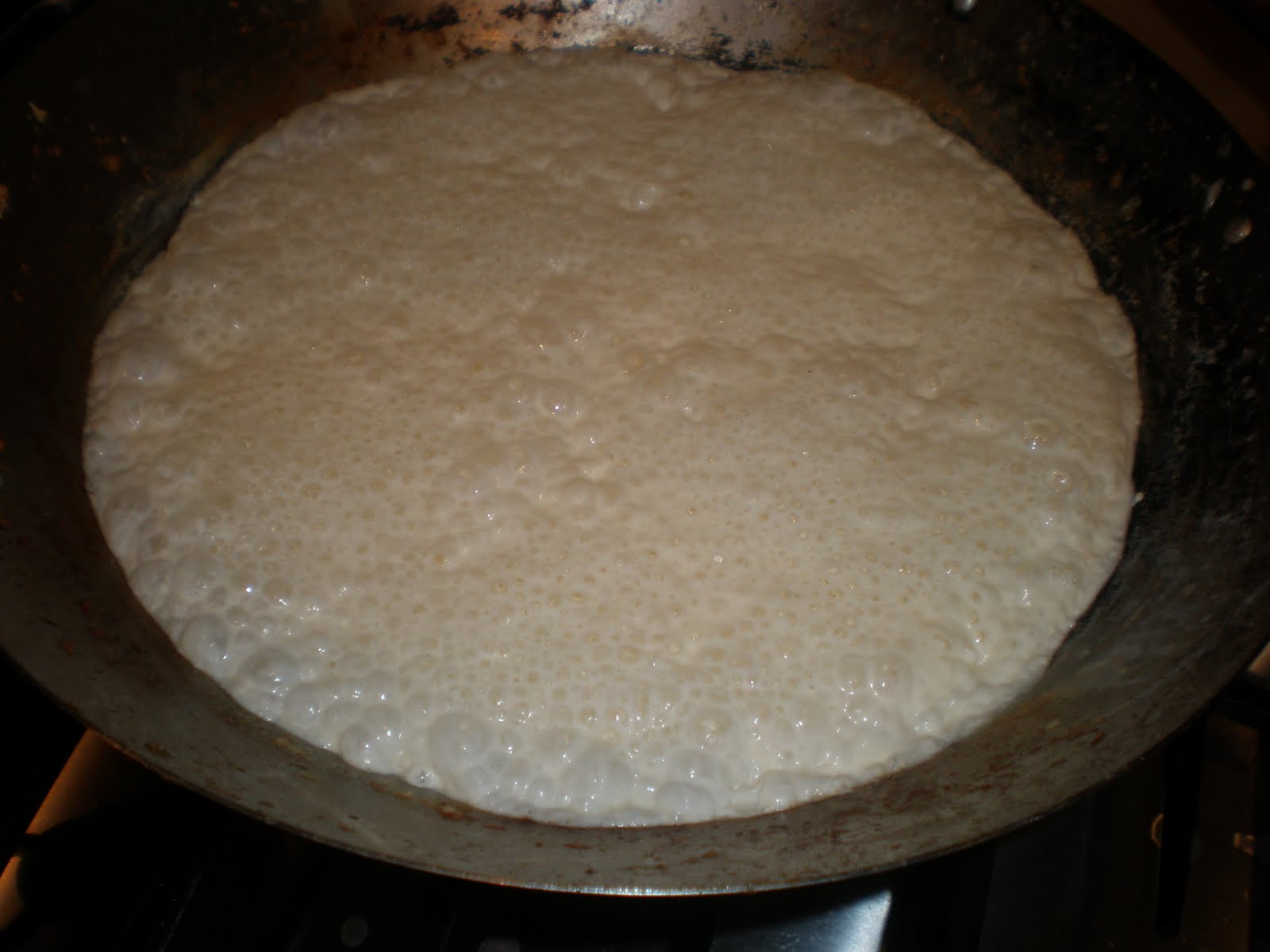 A sophisticated presentation of creamy garlic prawns in a white wine reduction