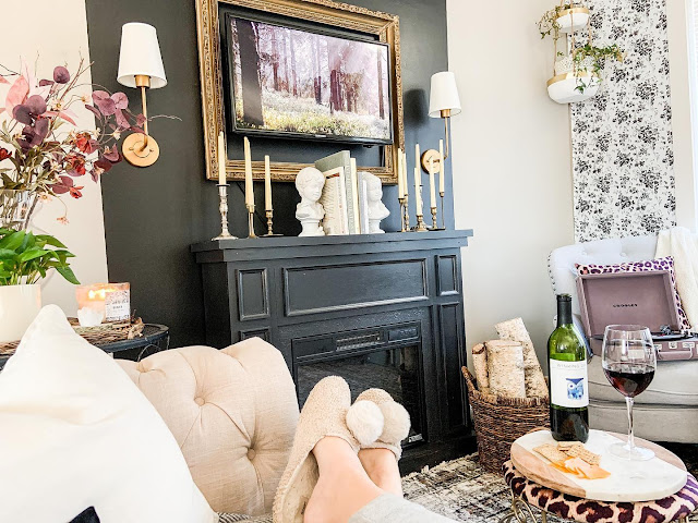 gold faux sconces on fireplace