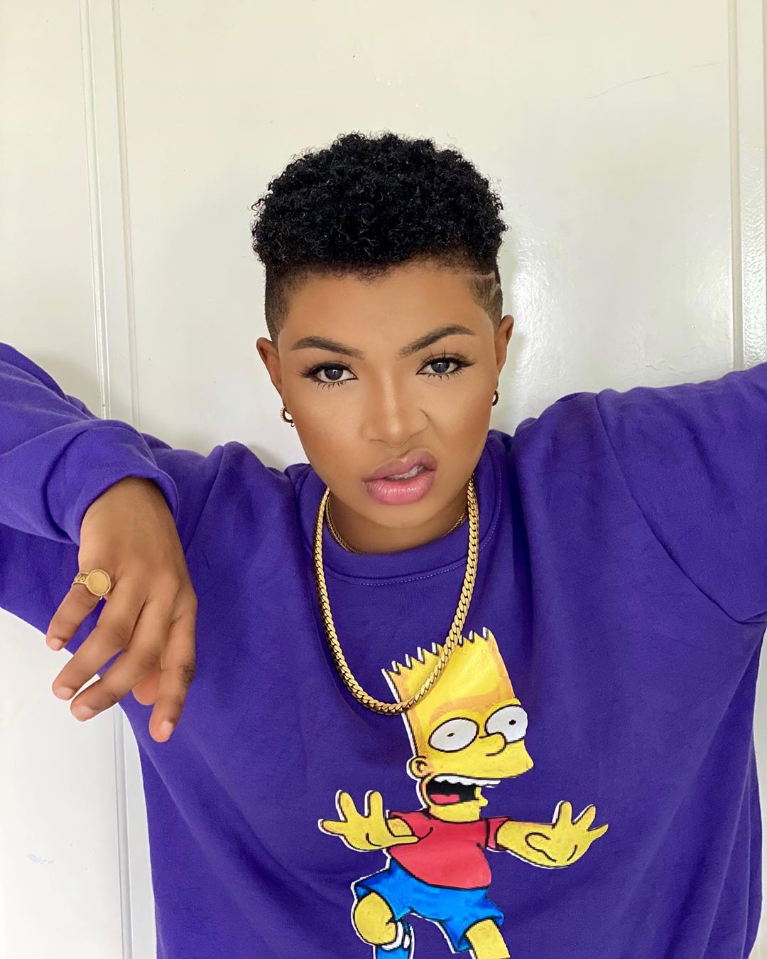 Hairstyles Liquorose likes to Rock different kinds of hair styles. She likes low cut, Afro