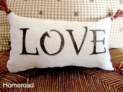 lumbar pillow with LOVE and corner tassels