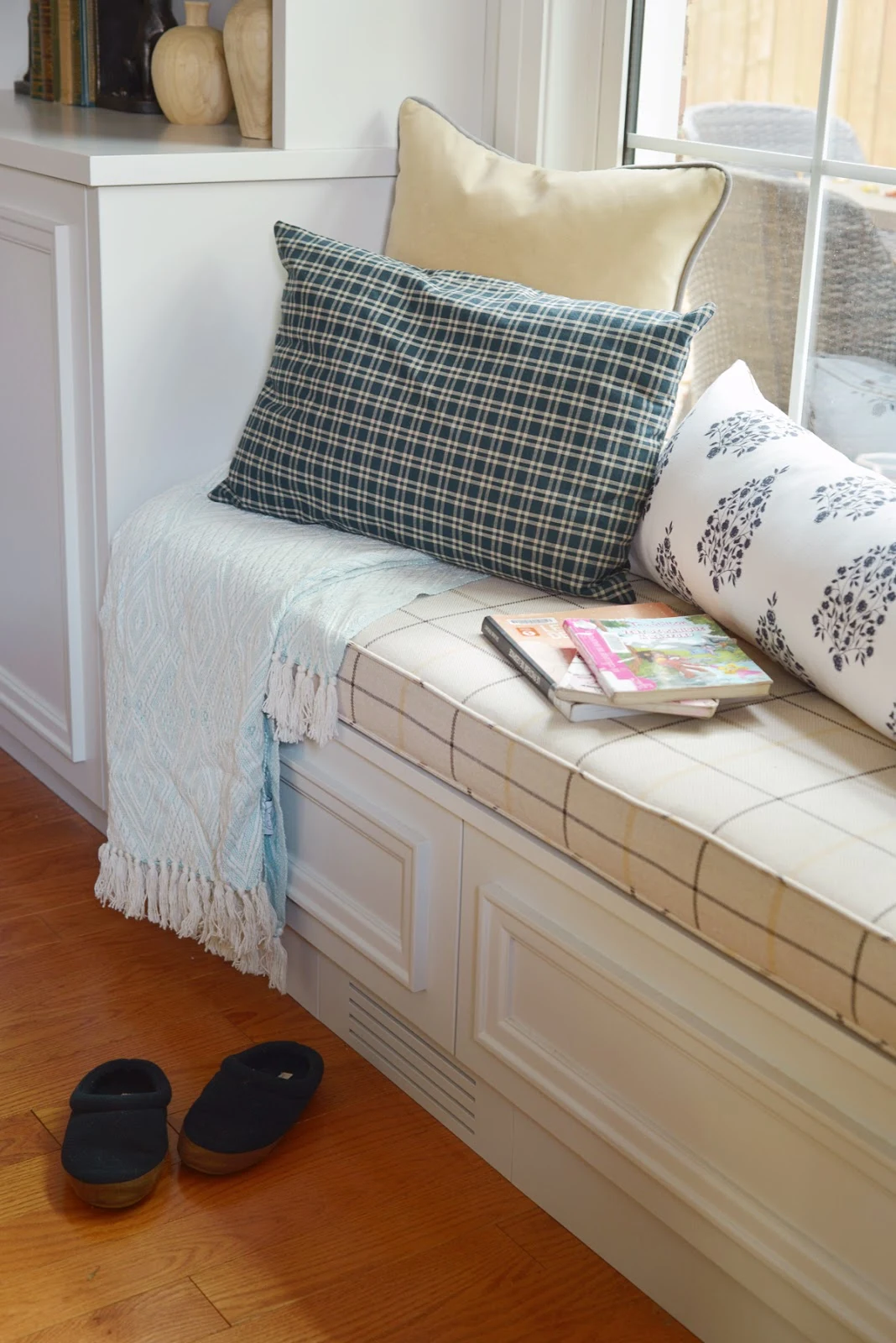 simple fall decor, built in window bench seat with bookcases