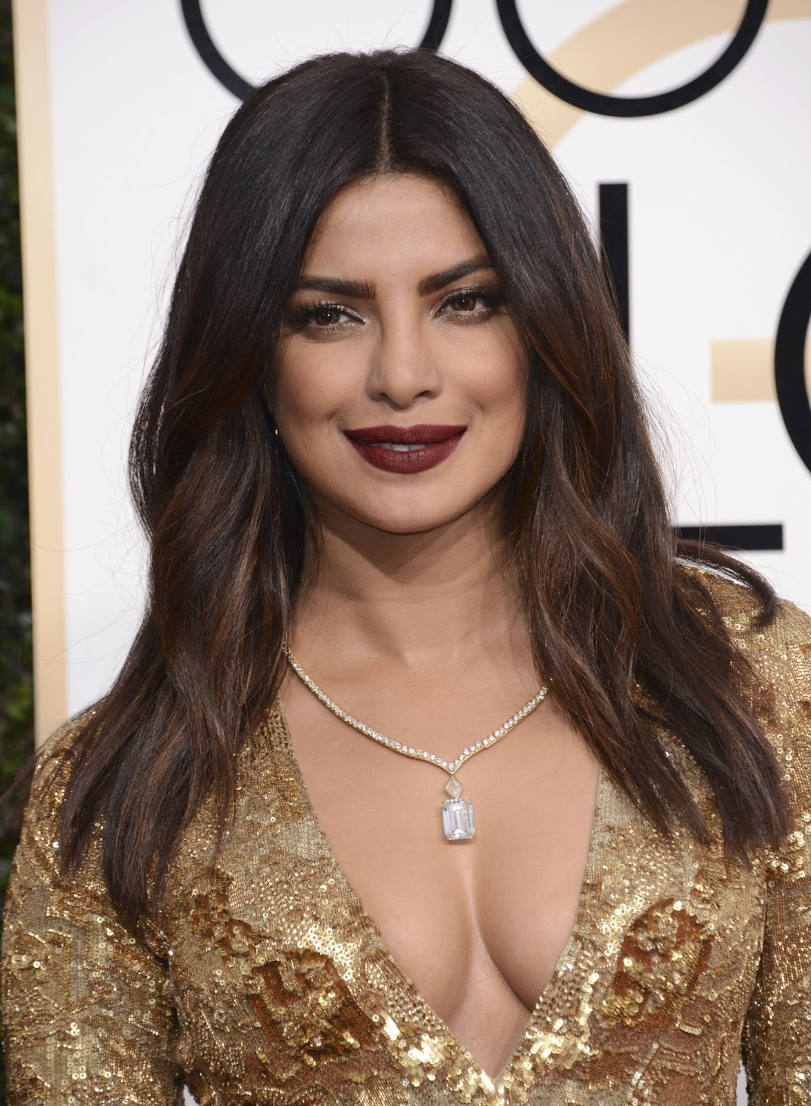 Priyanka Chopra Sexy Cleavage Show at The 74th Annual Golden Globe Awards at The Beverly Hilton Hotel in Beverly Hills