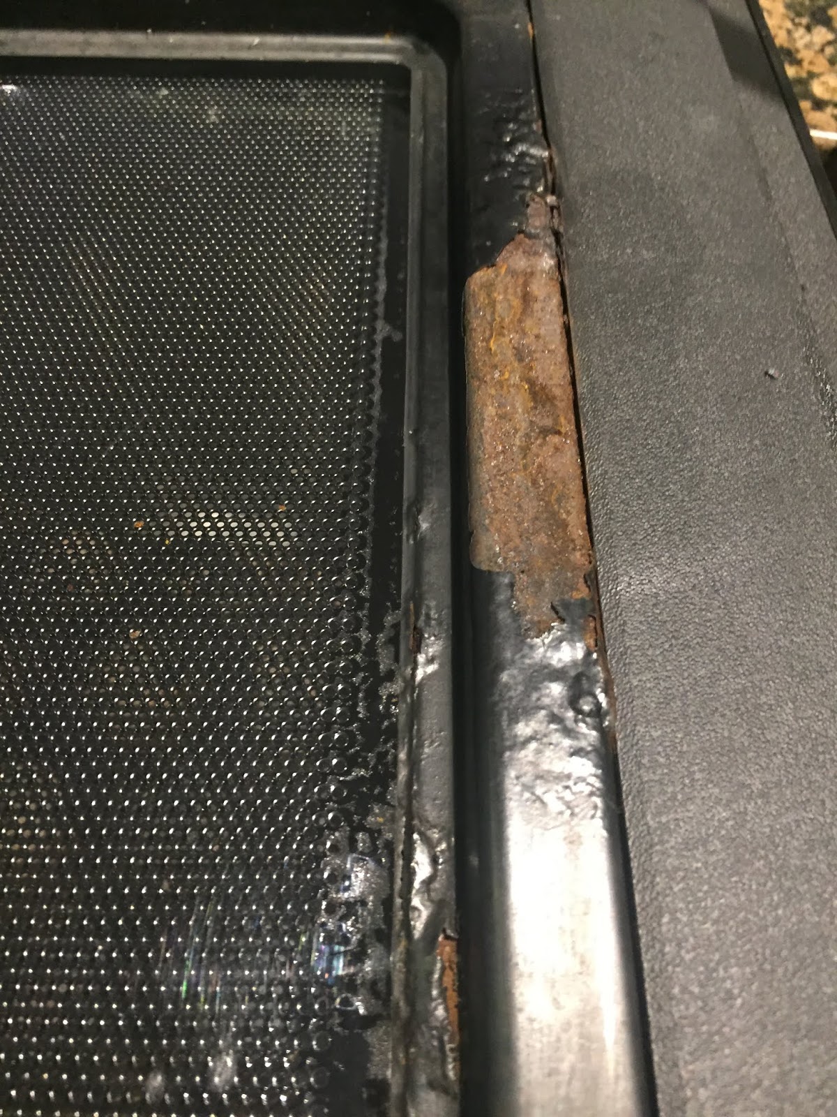 Repairing a Bosch microwave oven with a rusty door