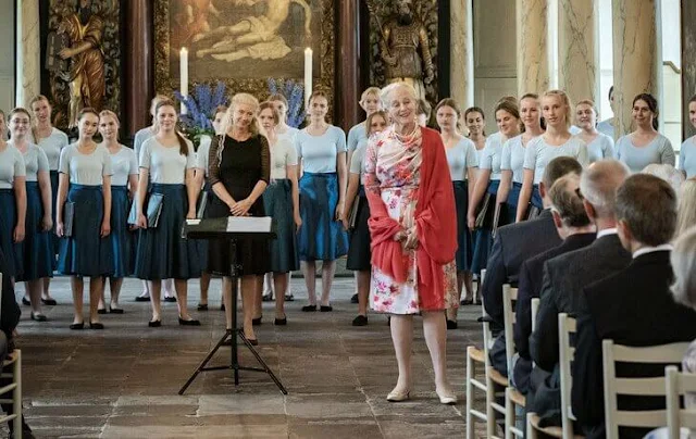 Queen Margrethe wore a floral print silk summer midi dress. Princess Benedikte wore a blue silk midi dress