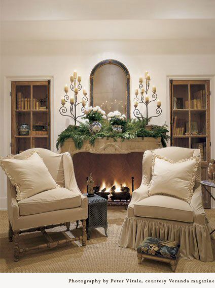 Pamela Pierce designed interior with neutral palette, antiques, romantic slipcovers, and spare decor. #frenchcountry #interiordesign
