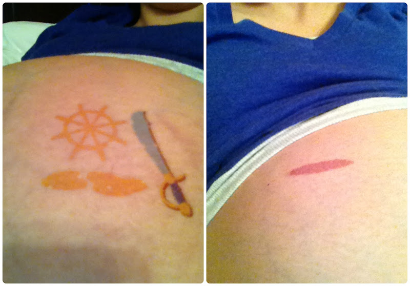 My OB always gets a kick out of seeing my new belly tattoos courtesy  title=