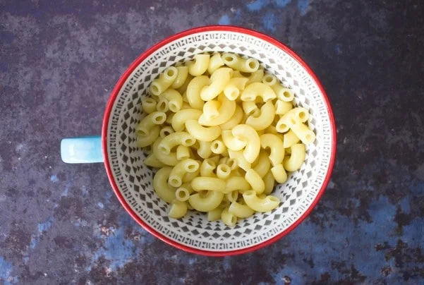 Cooked pasta in mug