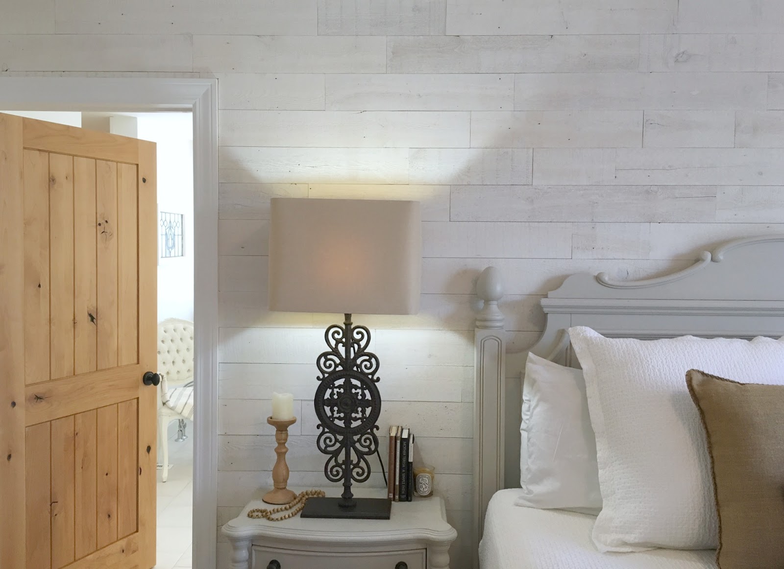 Wood plank wall in bedroom at Hello Lovely fixer upper Stikwood Hamptons.